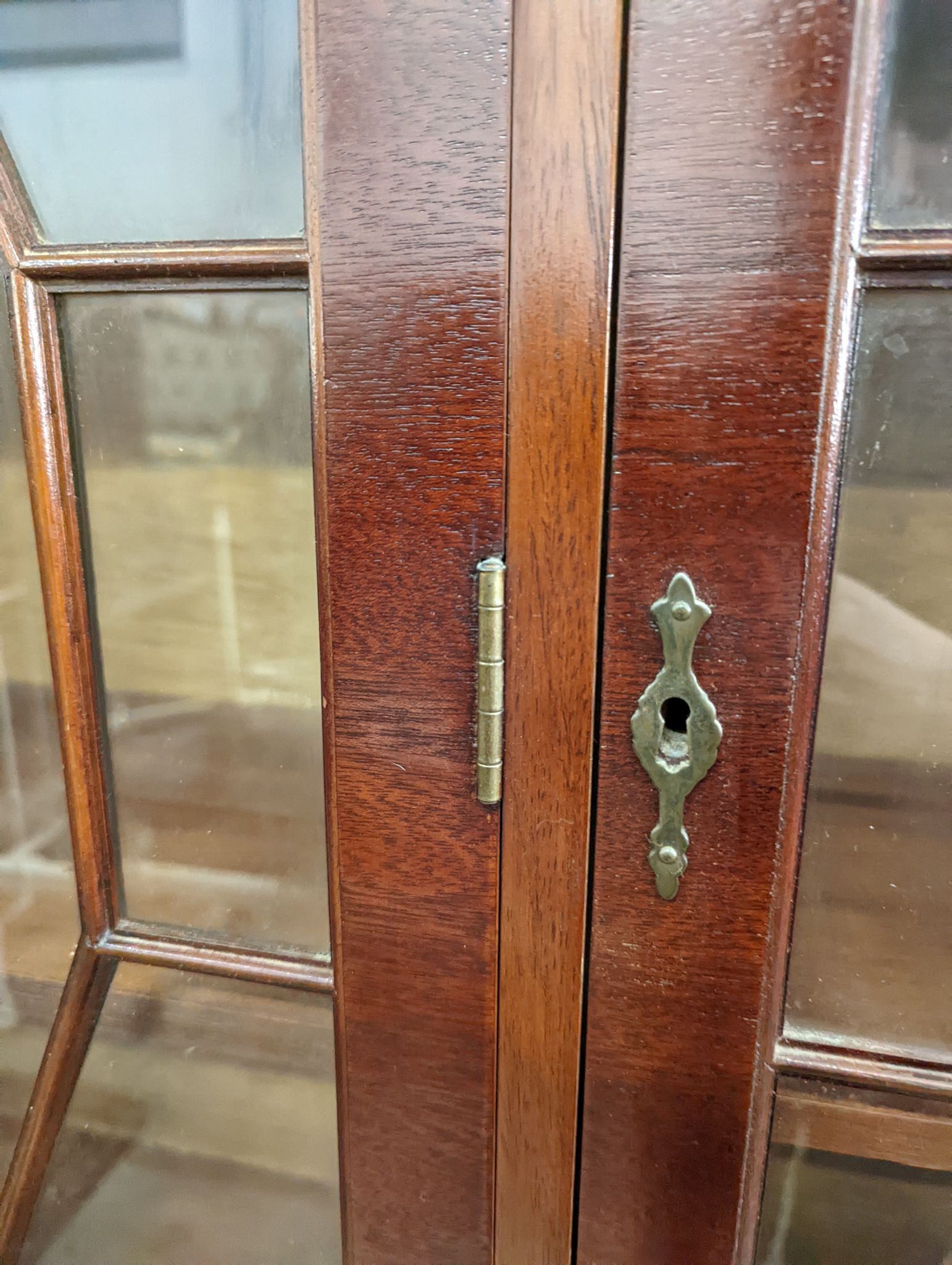 A reproduction George III style mahogany library bookcase, length 154cm, depth 41cm, height 193cm